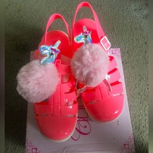 Adorable hot pink flat form jelly sandals w/unicorn Pom Poms
